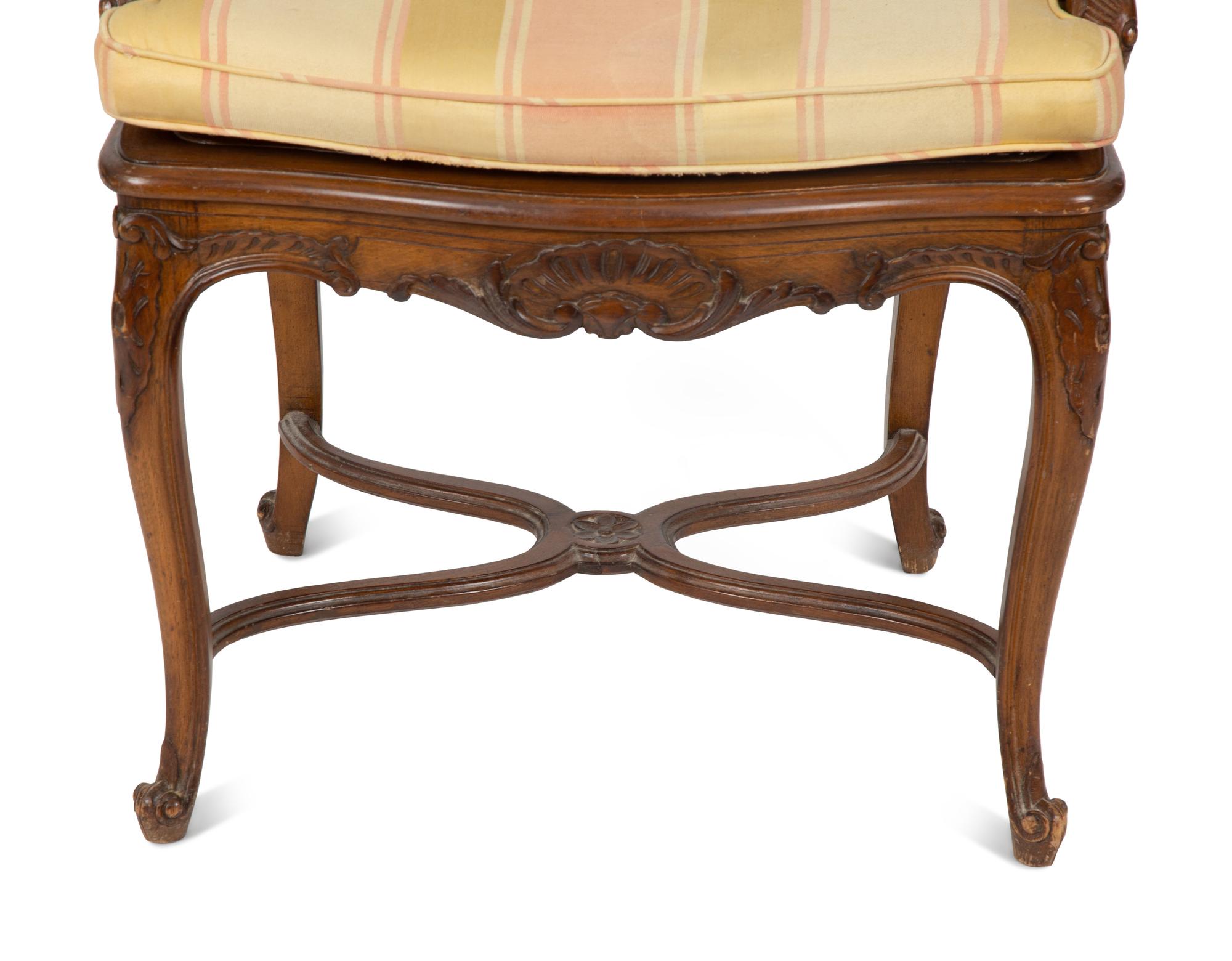 A Louis XV Style Carved Mahogany Cane Seat and Back Fauteuil — 20TH CENTURY
