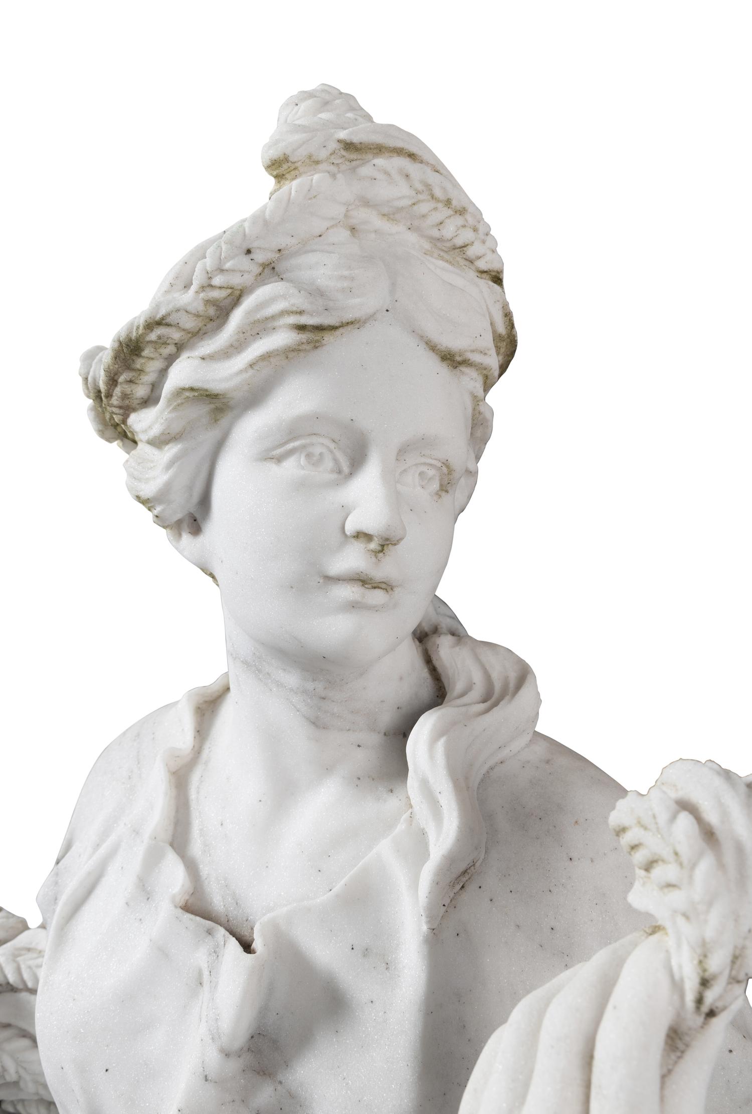 A Set of Four Monumental Carved Marble Garden Herms Allegorical of the Four Seasons