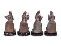 A Set of Four Chinese Underglaze Blue and Red Porcelain Figures of Guardians