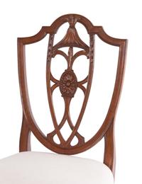 A Set of Four Federal Carved Cherrywood Shield-Back Dining Chairs