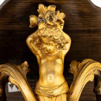 A Pair of French Gilt Bronze and Hardwood Wall Brackets