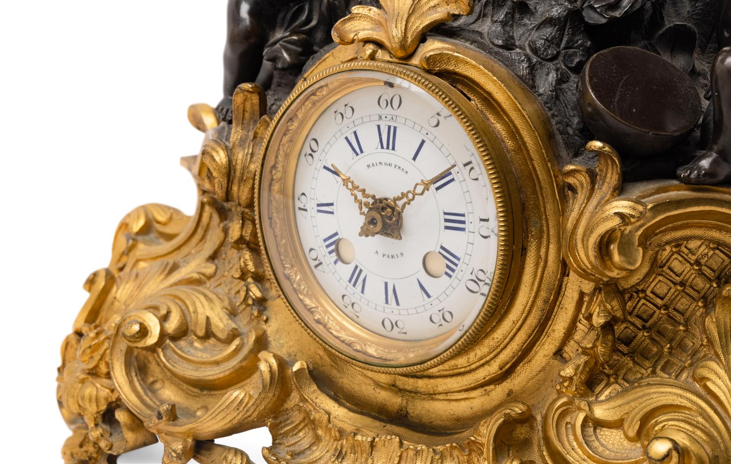 A French Gilt and Patinated Bronze Figural Mantel Clock