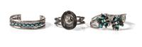 Three Southwestern Bracelets Length of one 5 1/4 x opening 1 1/4 x width 5/8 inches