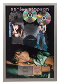 An Ashlee Simpson: Autobiography RIAA 3x Platinum Presentation Album 25 1/4 x 17 3/8 inches.