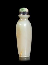 A Celadon and Russet Jade Snuff Bottle