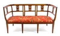 An Italian Fruitwood Settee — 19TH CENTURY