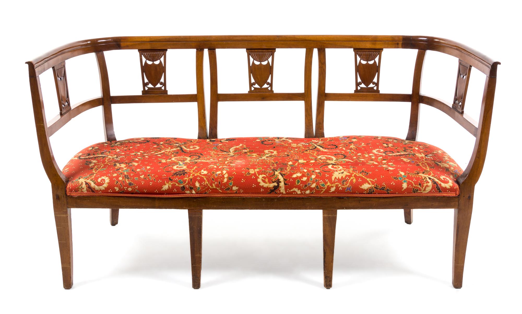 An Italian Fruitwood Settee — 19TH CENTURY