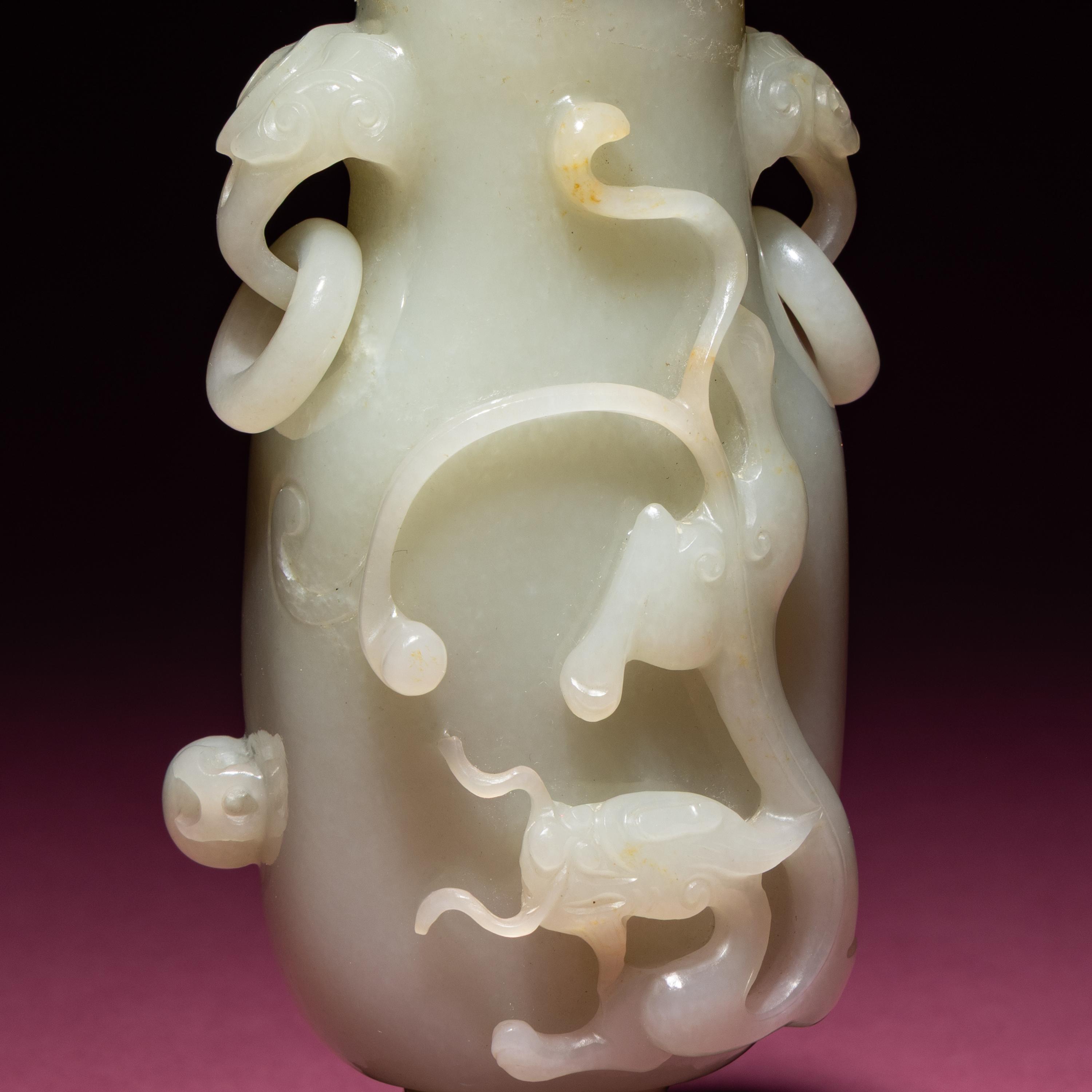 A Chinese Pale Celadon Jade 'Dragon' Covered Vase, 18th/19th Century — 清中期 青白玉螭龍紋雙耳賞瓶