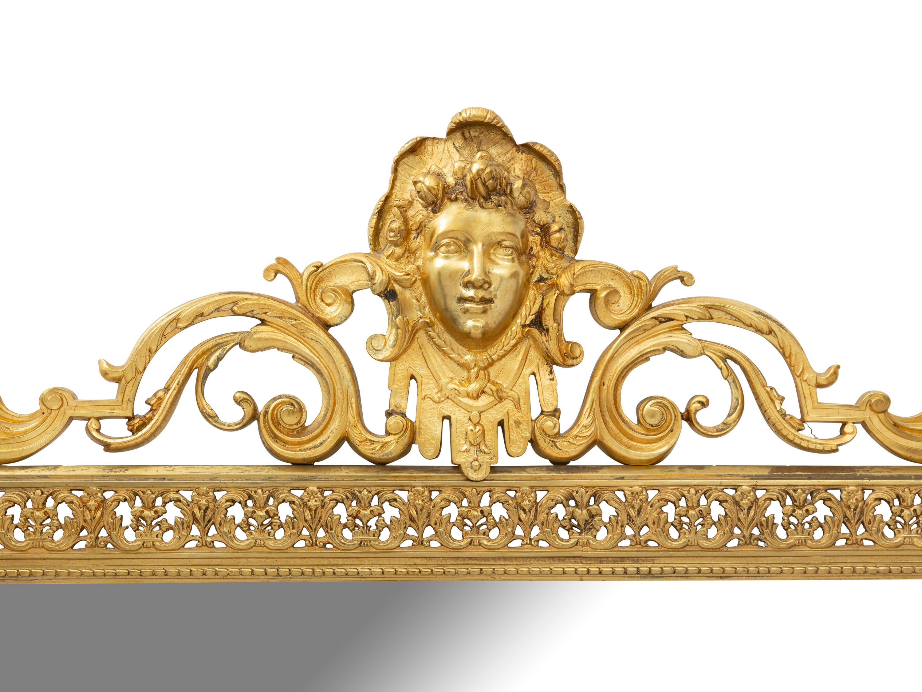 A Continental Gilt Cast Metal Mirror