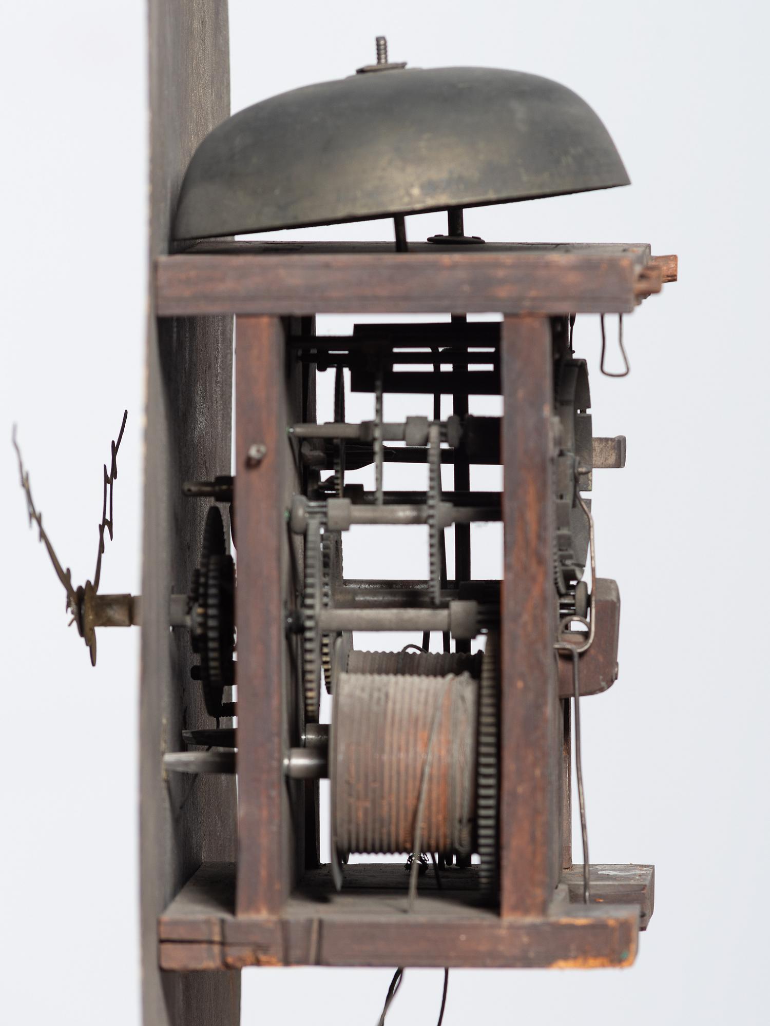 A Chippendale Cherrywood and Tiger Maple Tall Case Clock