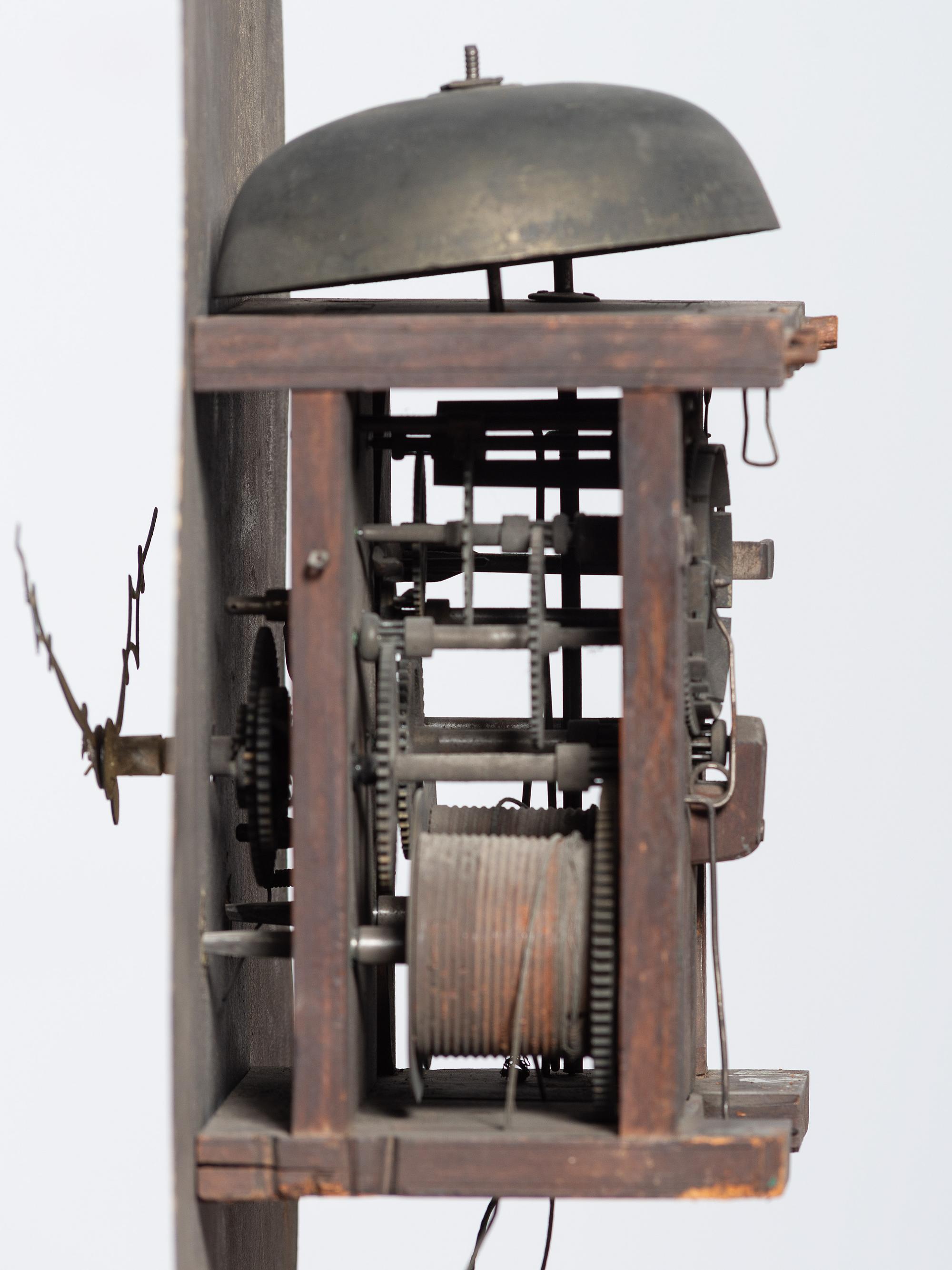 A Chippendale Cherrywood and Tiger Maple Tall Case Clock