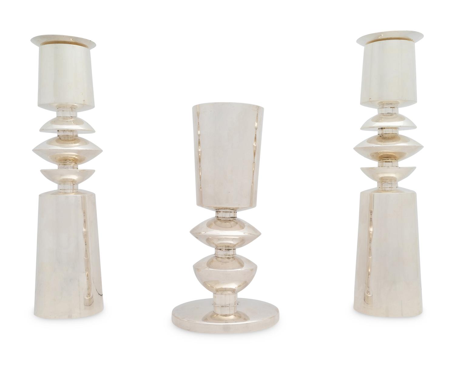 A Carmel Shabi Modernist Silver Kiddish Cup and Pair of Shabbat Candlesticks