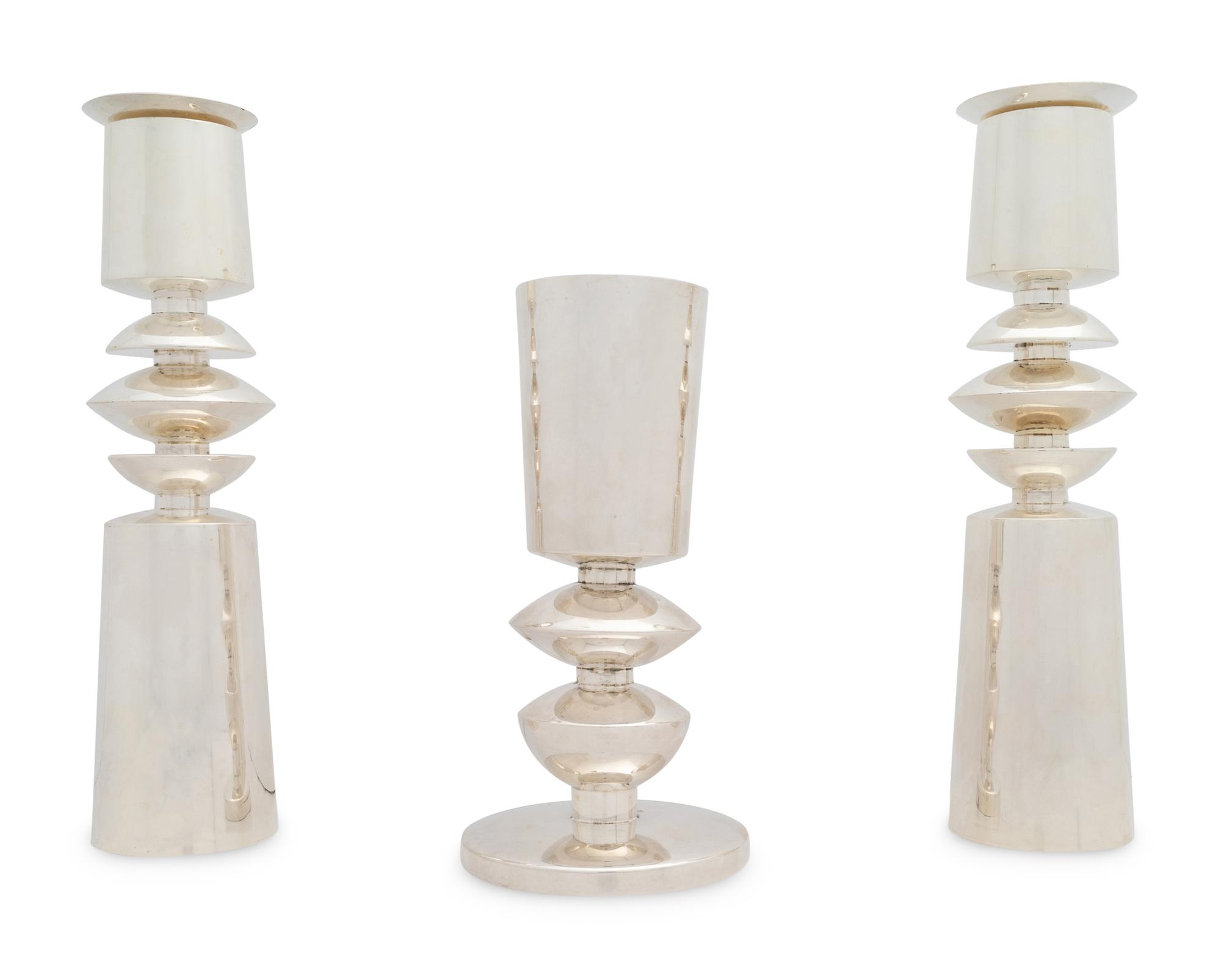 A Carmel Shabi Modernist Silver Kiddish Cup and Pair of Shabbat Candlesticks