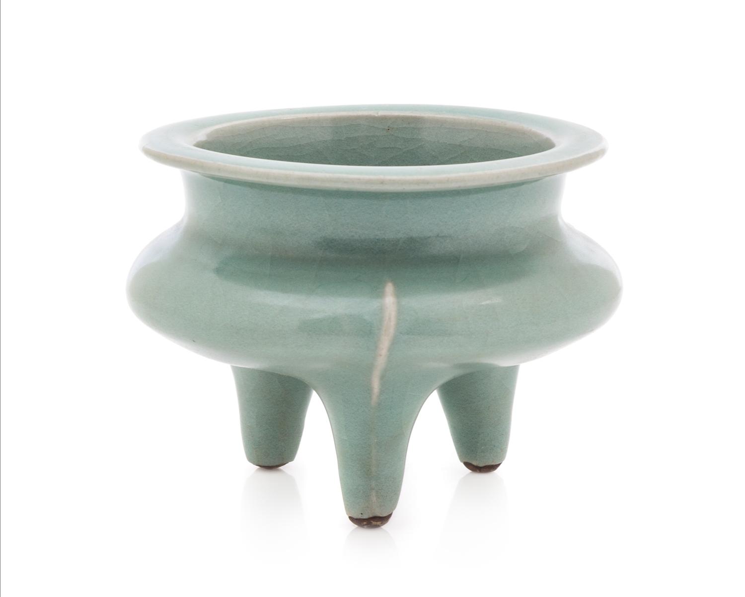 A Chinese Longquan Celadon Glazed Porcelain Tripod Censer SONG DYNASTY OR LATER Height 3 1/4 inches. — SONG DYNASTY OR LATER