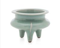 A Chinese Longquan Celadon Glazed Porcelain Tripod Censer SONG DYNASTY OR LATER Height 3 1/4 inches. — SONG DYNASTY OR LATER