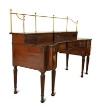 A Regency Mahogany Sideboard with Brass Rail