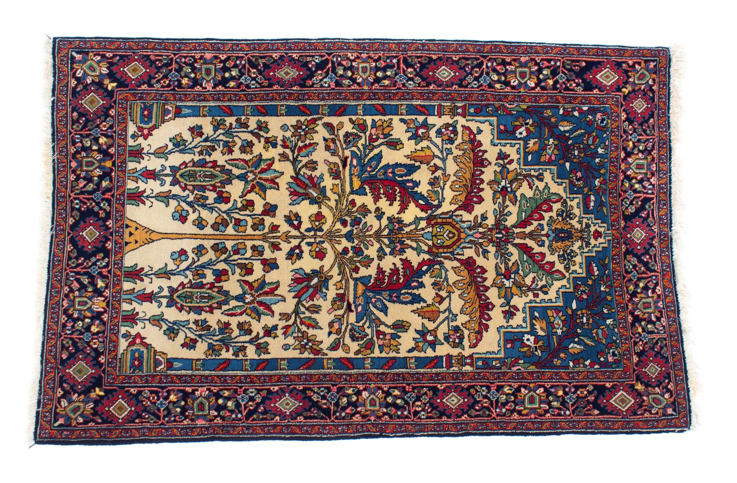 A Persian Tree-of-Life Wool Rug 62 1/2 x 43 inches. — 20TH CENTURY
