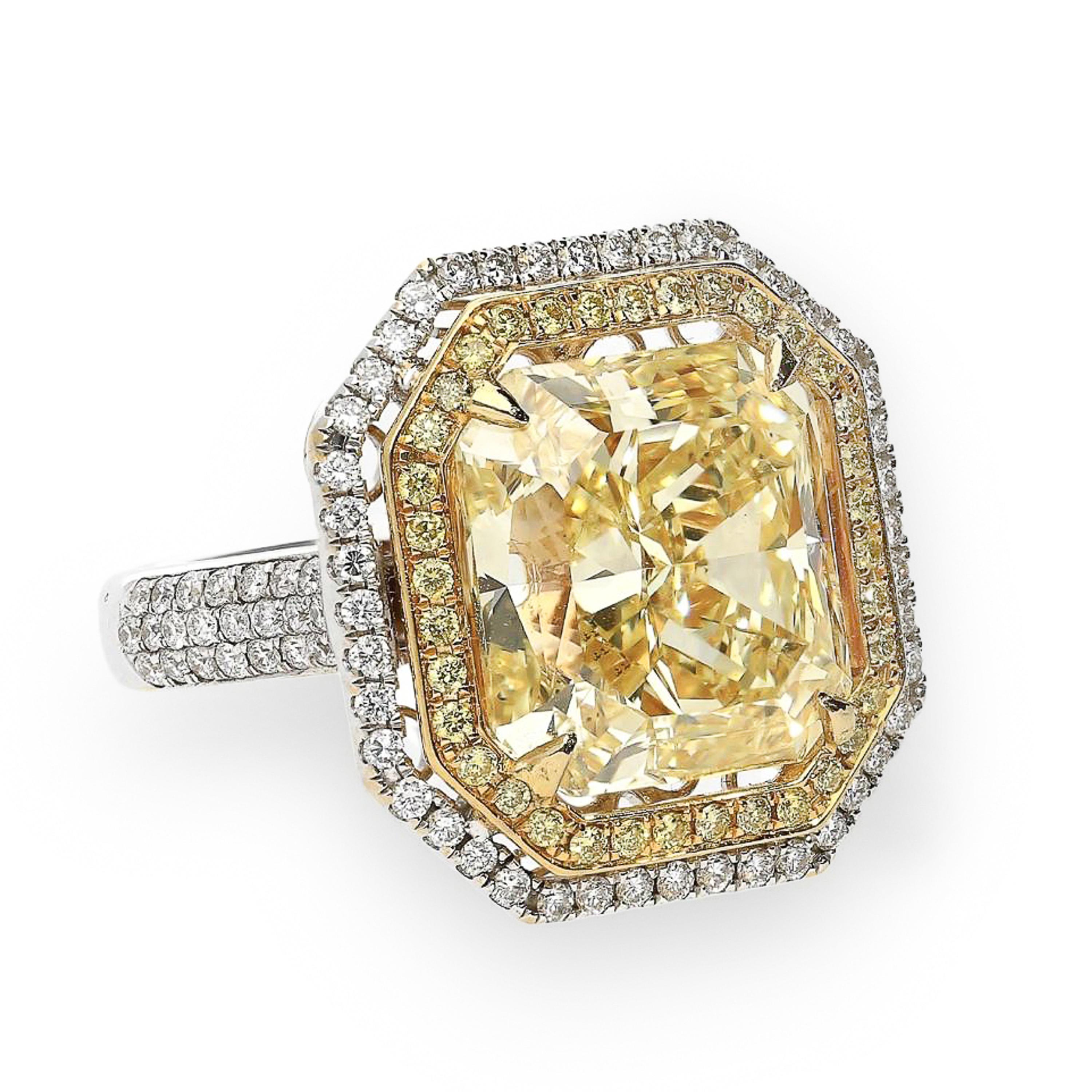 10.88 CARAT FANCY YELLOW DIAMOND AND DIAMOND RING