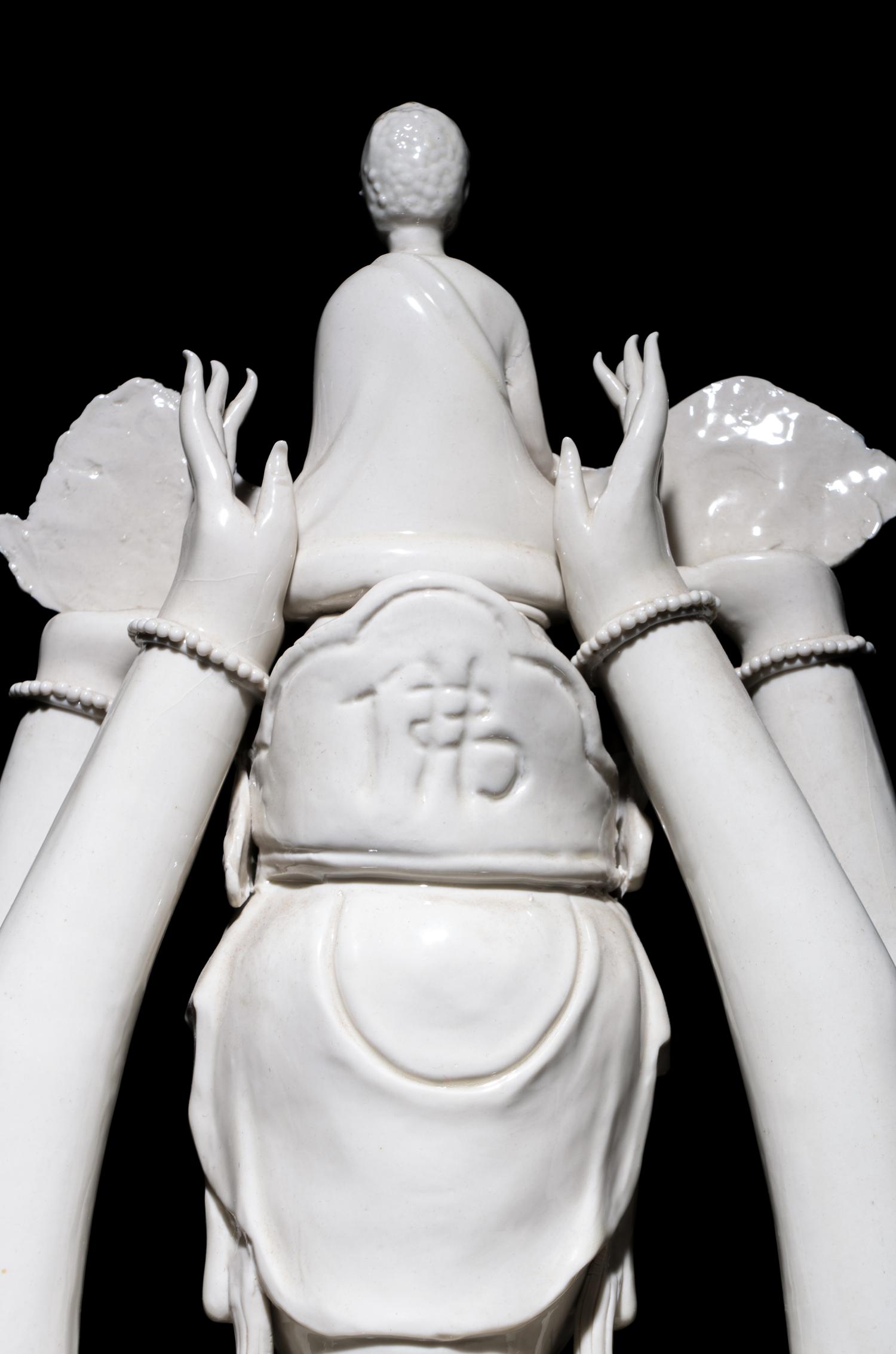 A Chinese Blanc-de-Chine Porcelain Figure of Guanyin