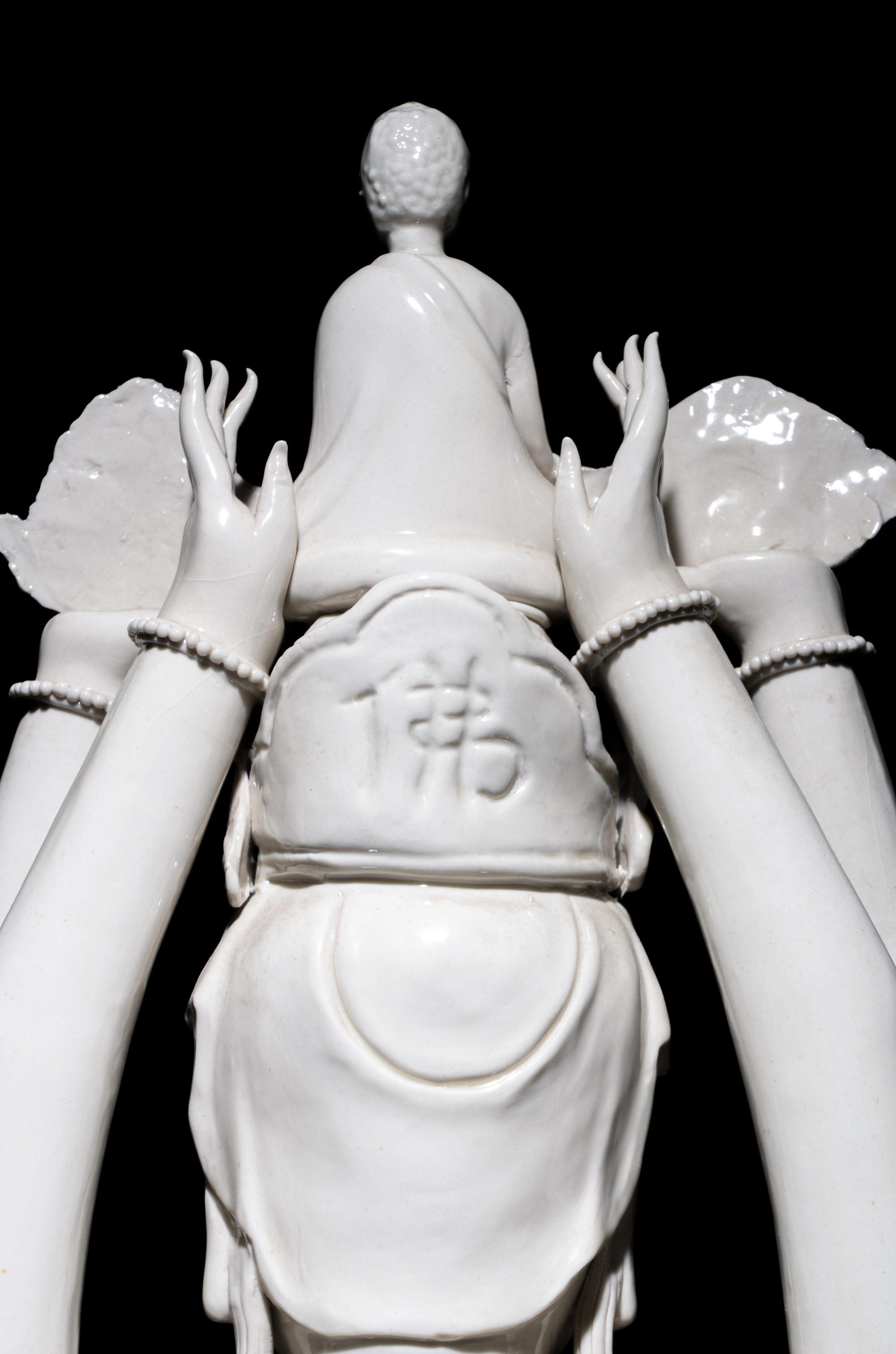 A Chinese Blanc-de-Chine Porcelain Figure of Guanyin
