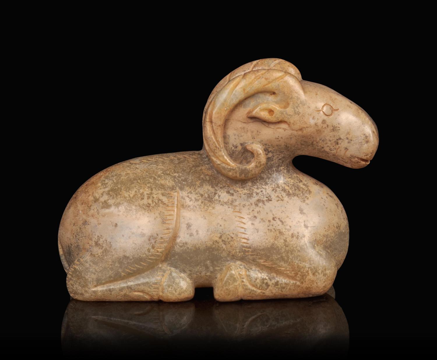A Calcified Jade Figure of a Ram