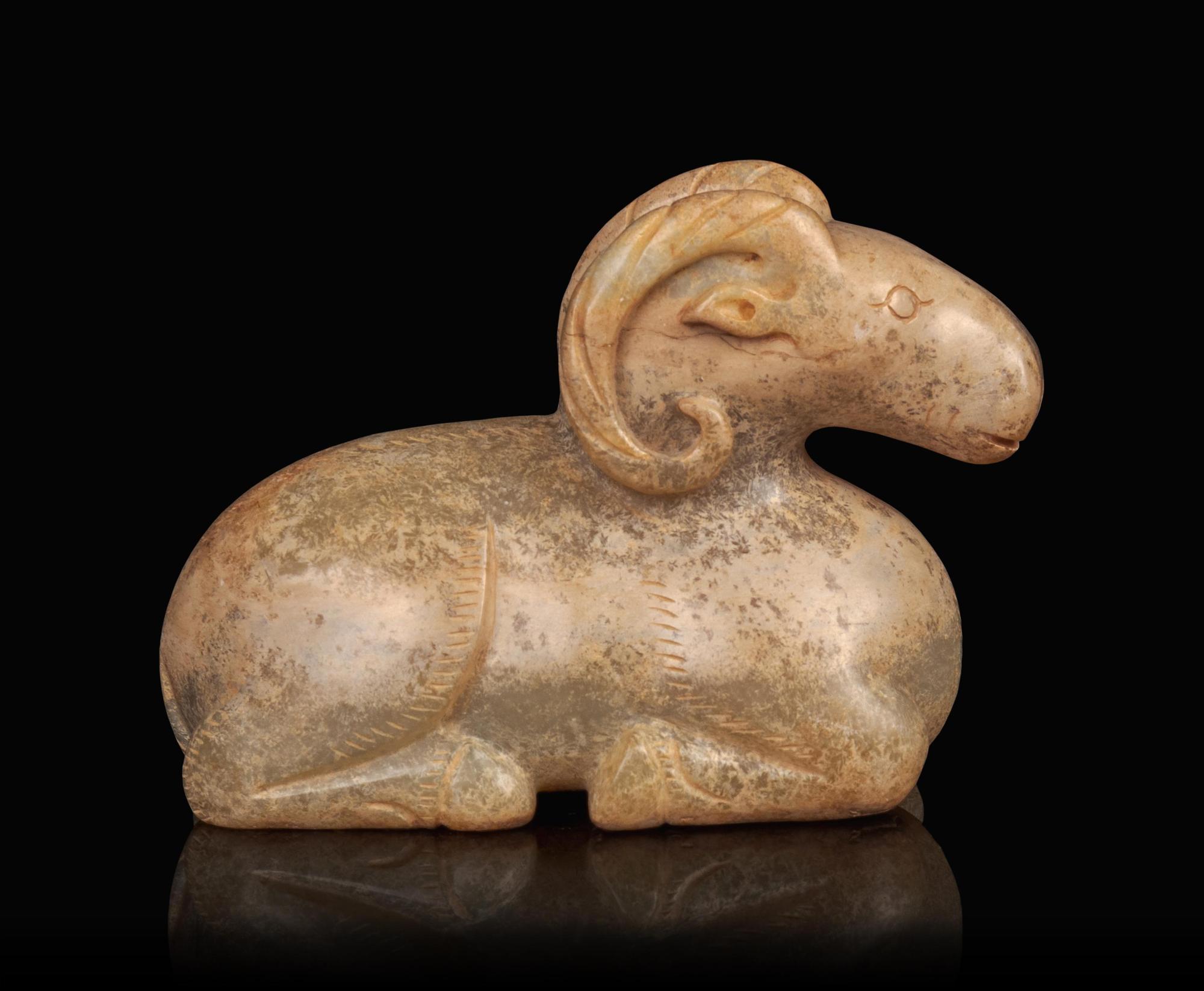 A Calcified Jade Figure of a Ram