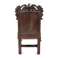 A Charles II Carved Oak Joined Armchair