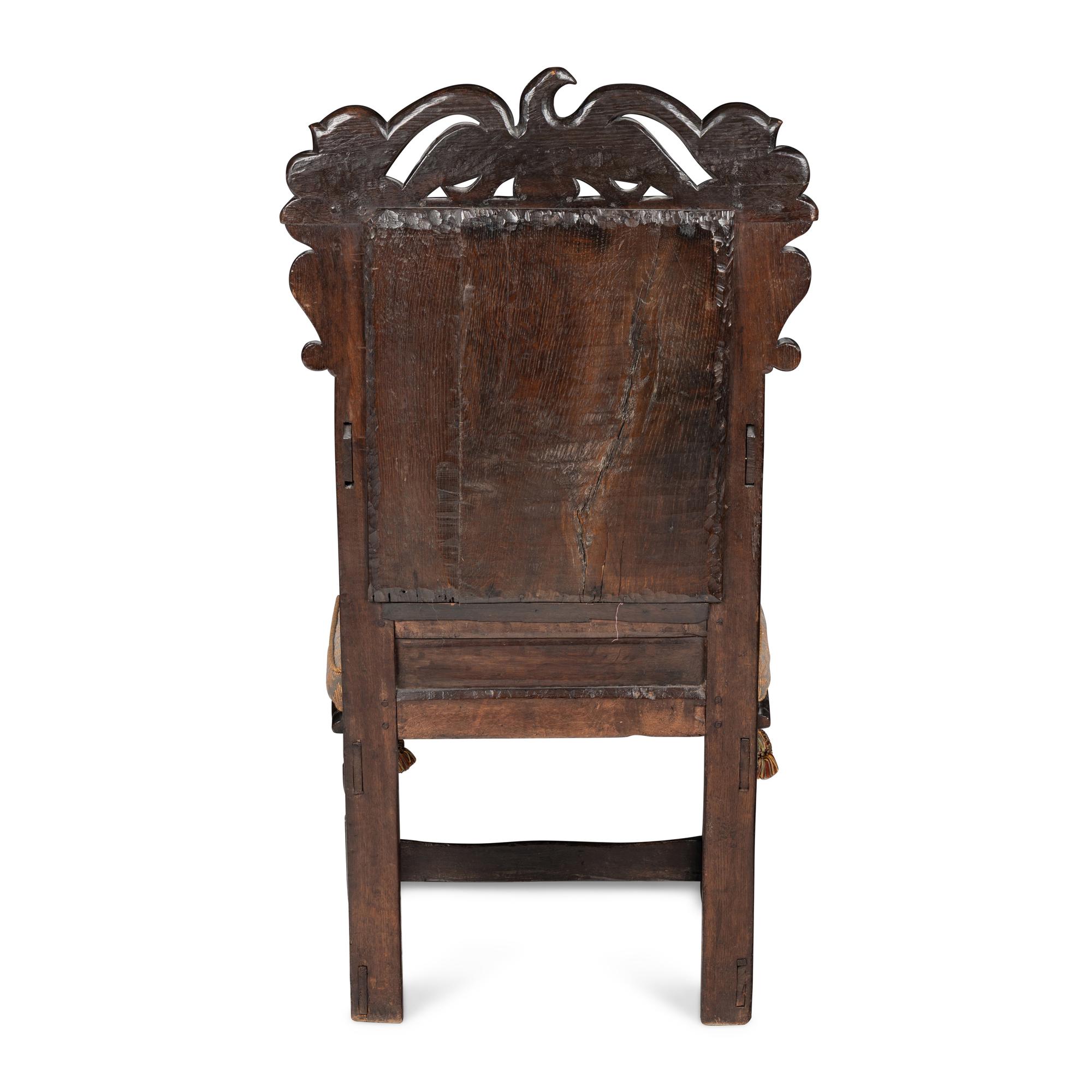 A Charles II Carved Oak Joined Armchair