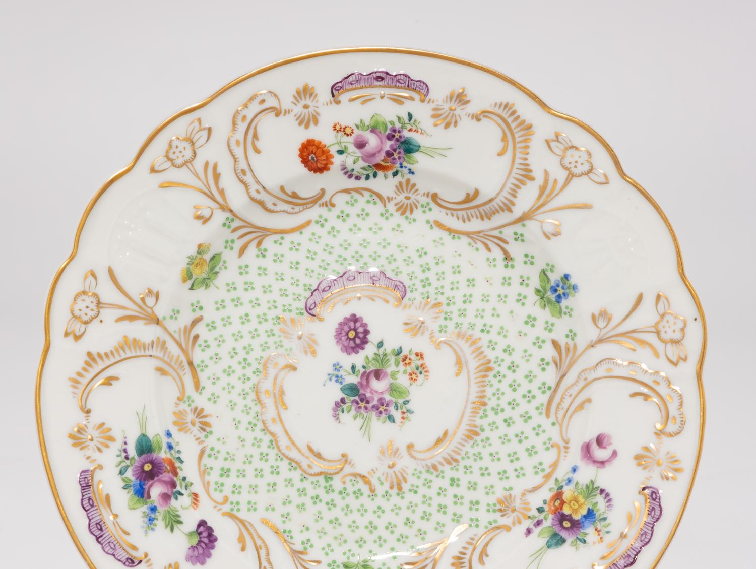 A Set of Five Herend Porcelain Fleur des Indies Dessert Plates