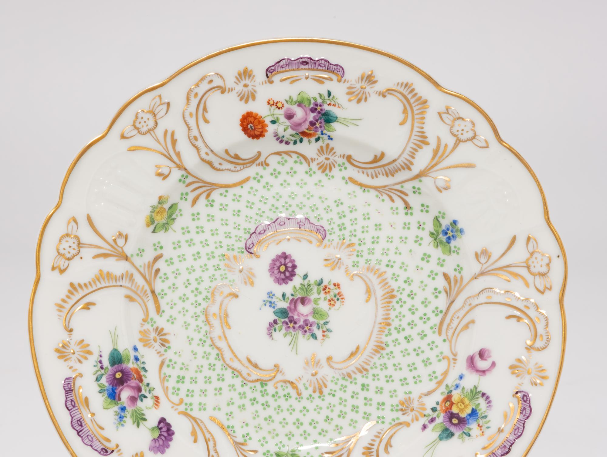 A Set of Five Herend Porcelain Fleur des Indies Dessert Plates
