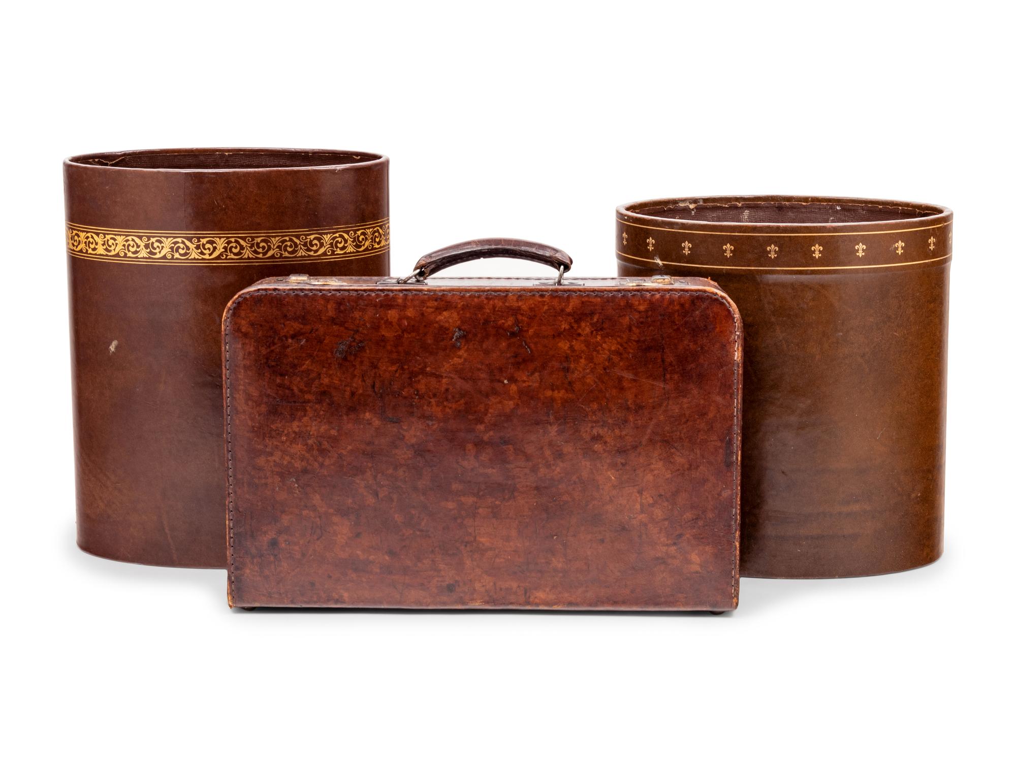 A Vintage Leather Case and Two Leather Wastebaskets