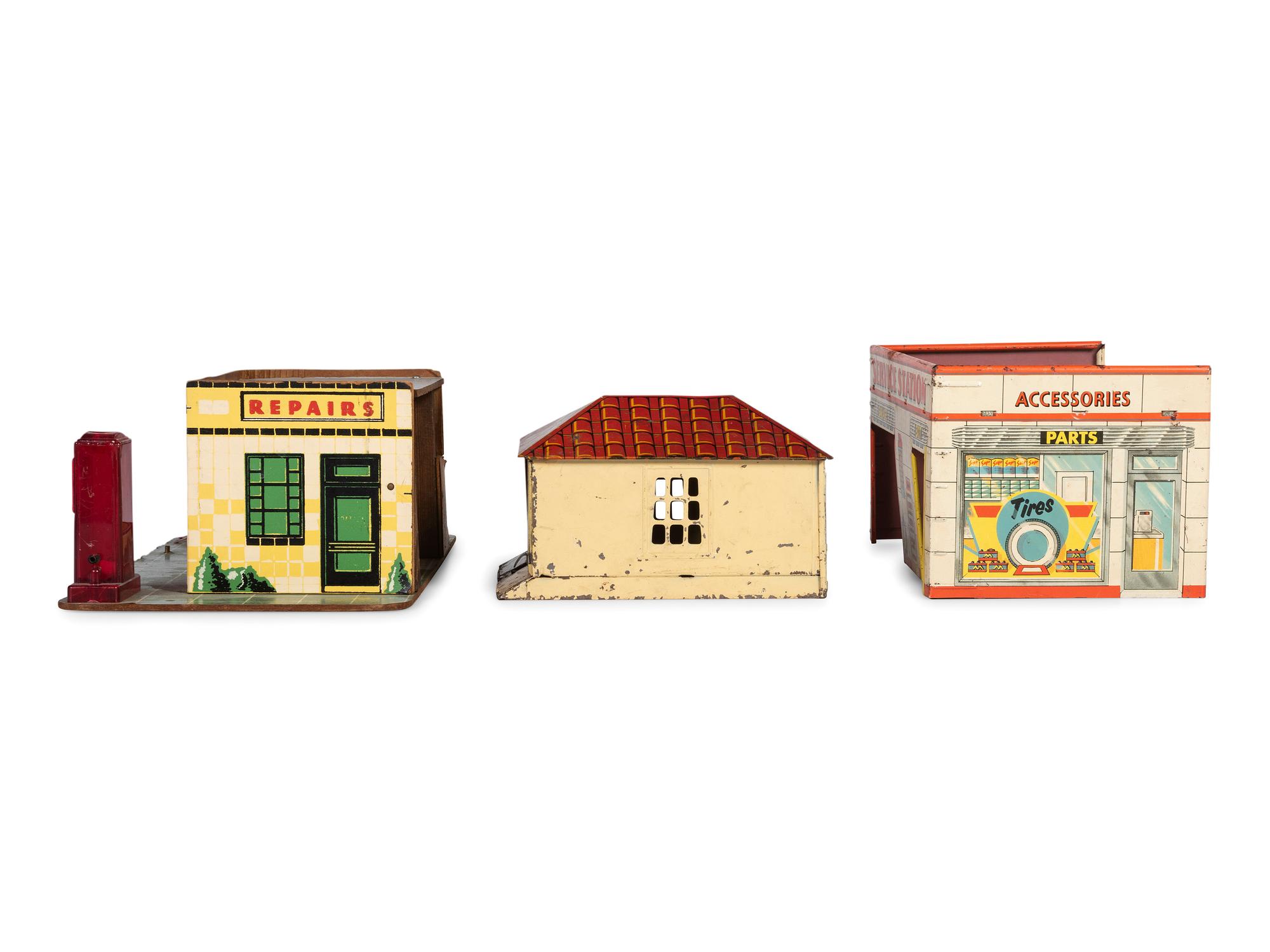 A Group of Toy Service Stations and Cars