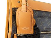 A Louis Vuitton Leather Garment Bag — 20TH CENTURY