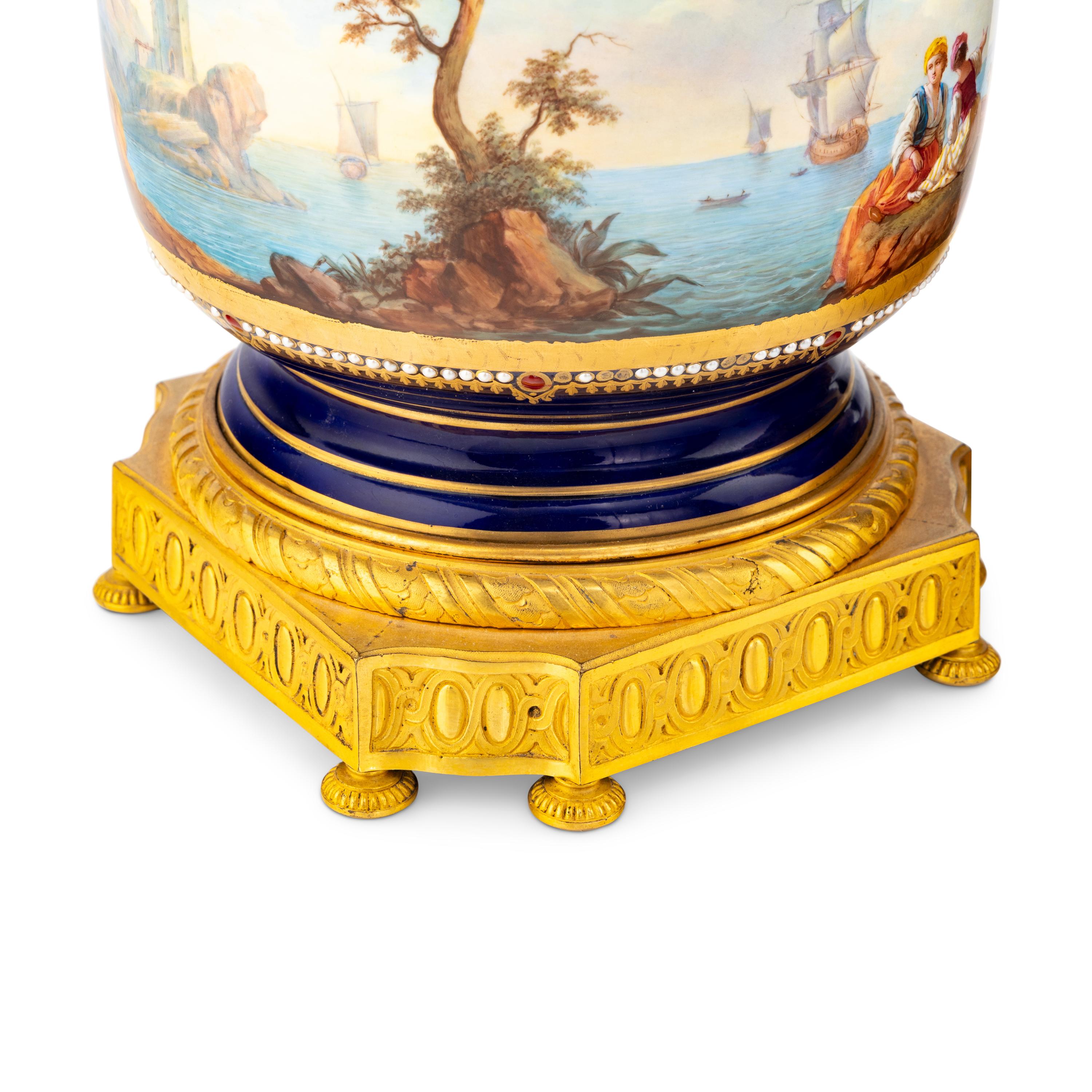A Pair of Sèvres Style Gilt Bronze Mounted Porcelain Cache Pots