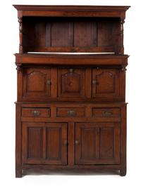 An English Oak Cupboard, Height 80 3/4 x width 53 x depth 20 1/4 inches.
