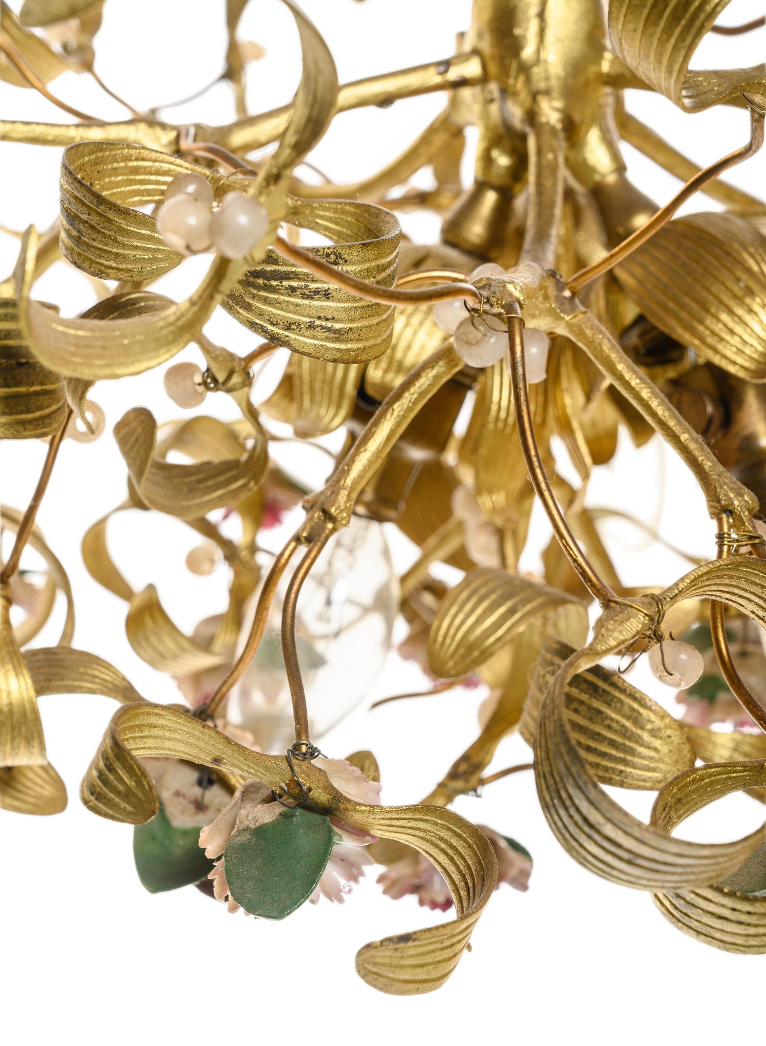 A Gilt Metal and Porcelain Three-Light Chandelier