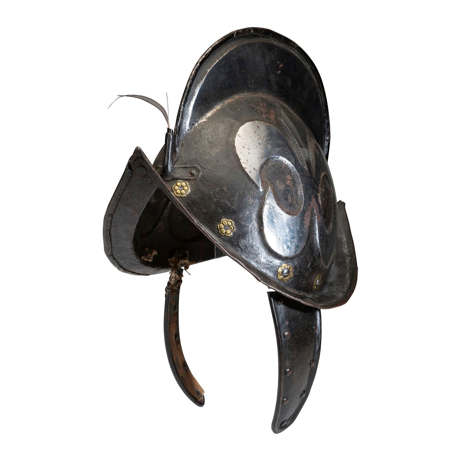 A German Black and White Comb Morian Helmet with Ear Flaps