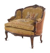 A Louis XV Style Carved Walnut Settee with Tapestry Upholstery