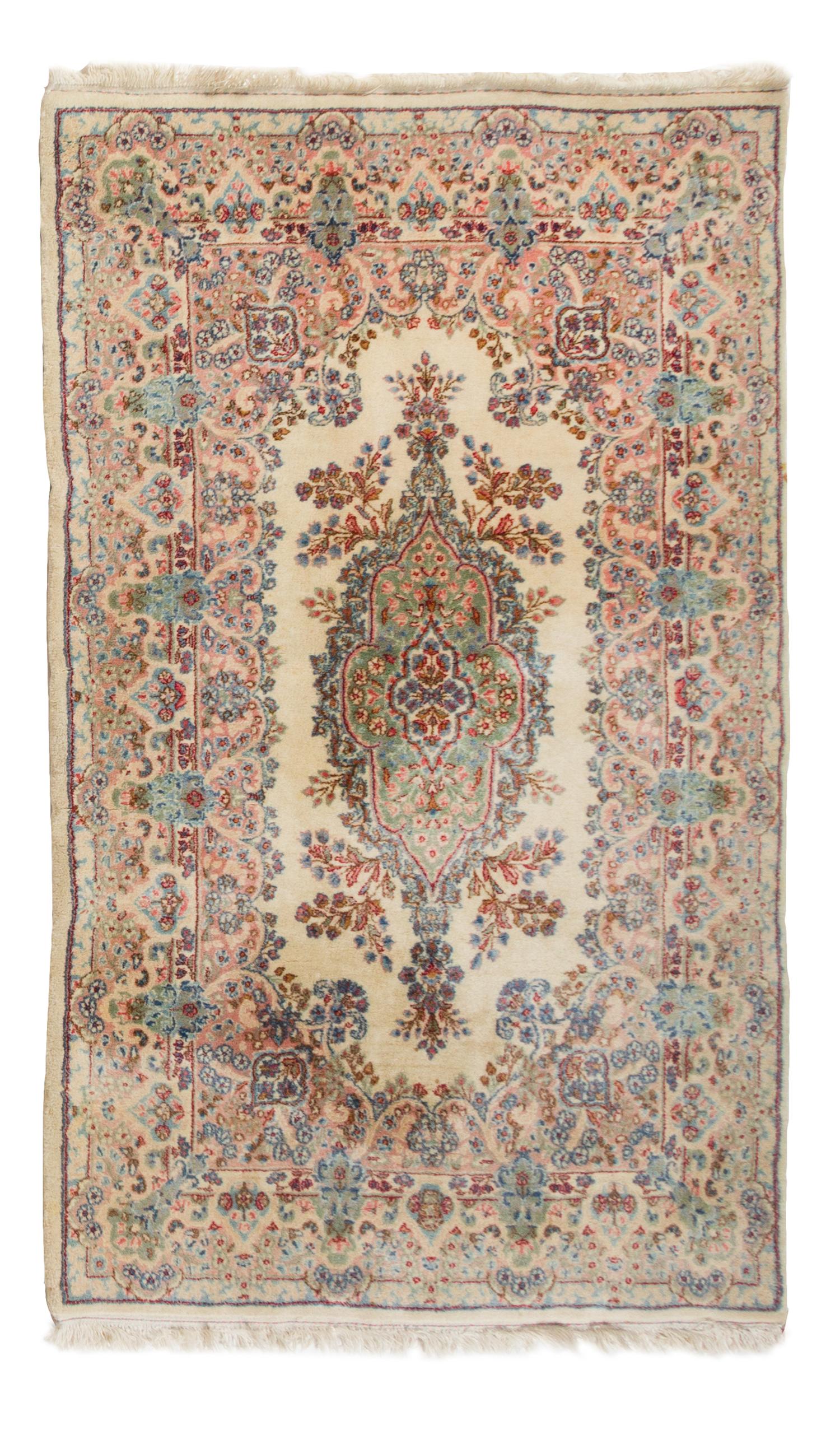 A Pair of Kirman Wool Rugs