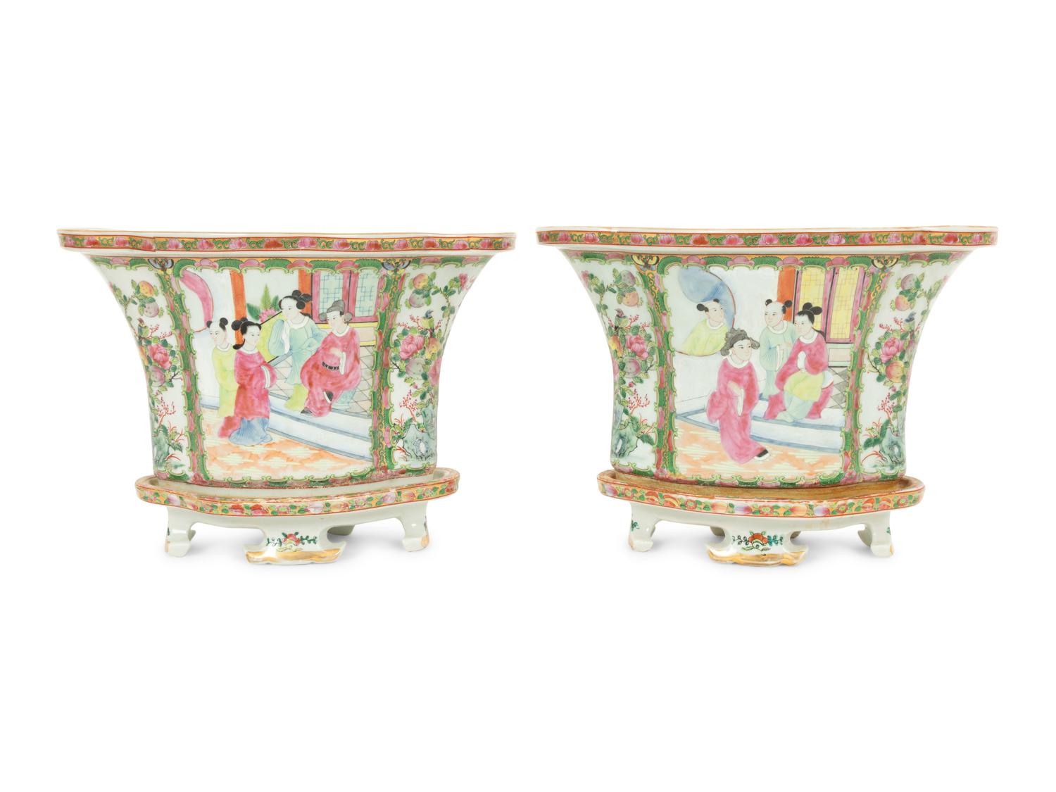 A Pair of Rose Canton Porcelain Oval Jardinieres on Conforming Footed Bases