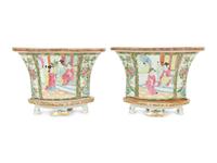 A Pair of Rose Canton Porcelain Oval Jardinieres on Conforming Footed Bases