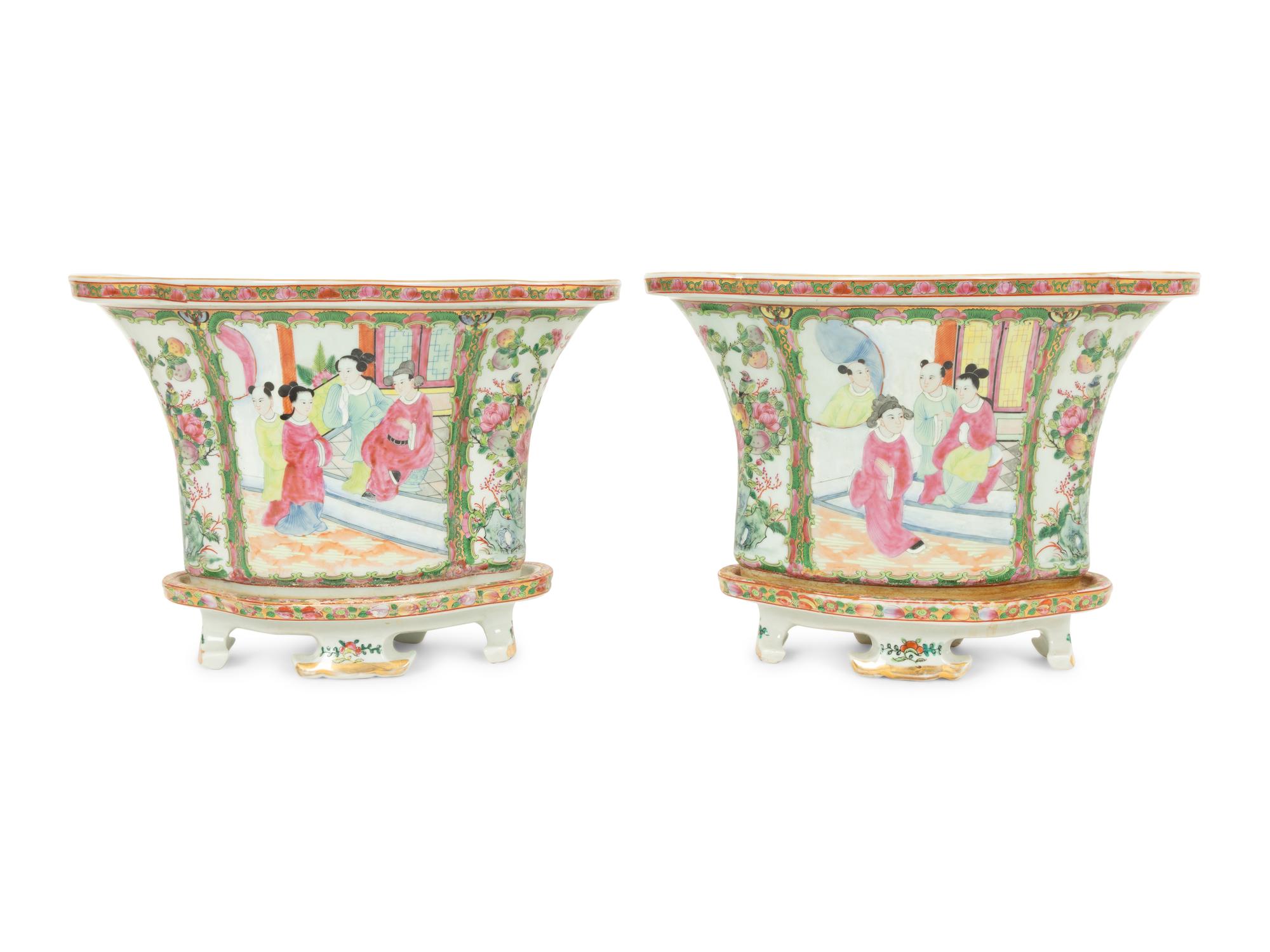A Pair of Rose Canton Porcelain Oval Jardinieres on Conforming Footed Bases