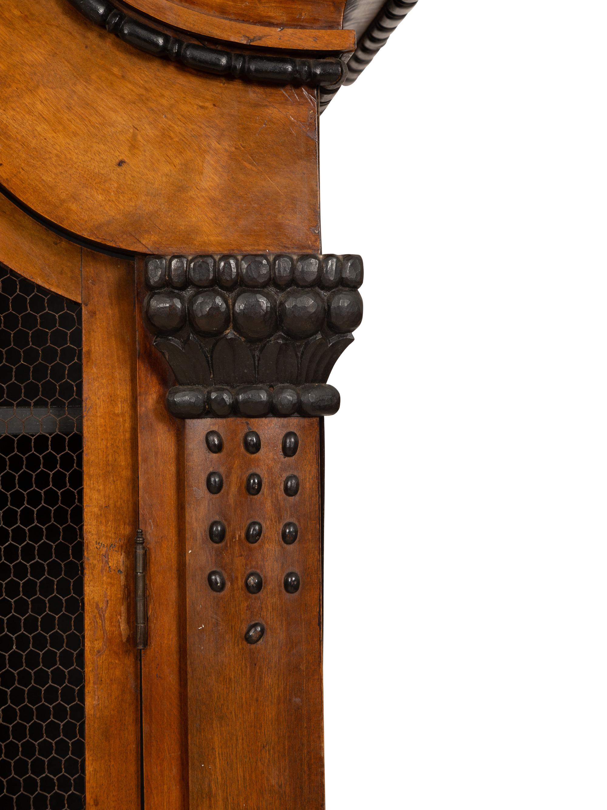 A Pair of Biedermeier Part-Ebonized Fruitwood Bookcases