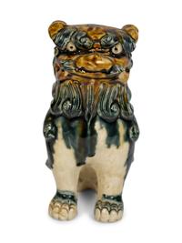 A Pair of Ceramic Models of Buddhistic Lions