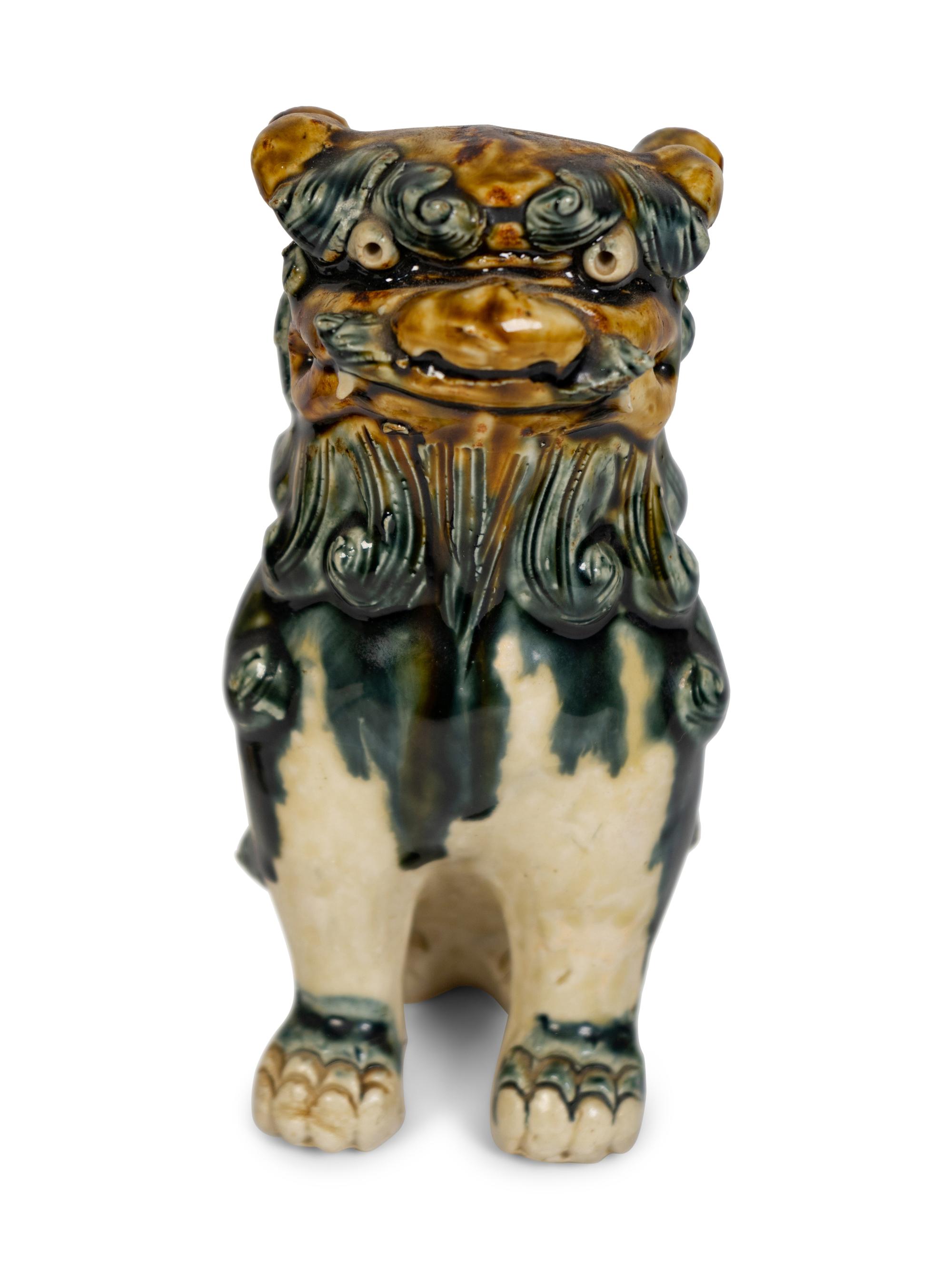 A Pair of Ceramic Models of Buddhistic Lions