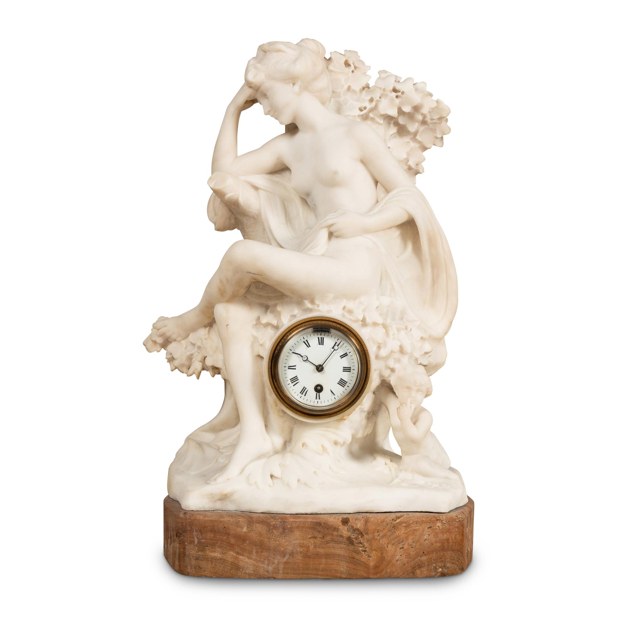 A Carved Marble Figural Mantel Clock