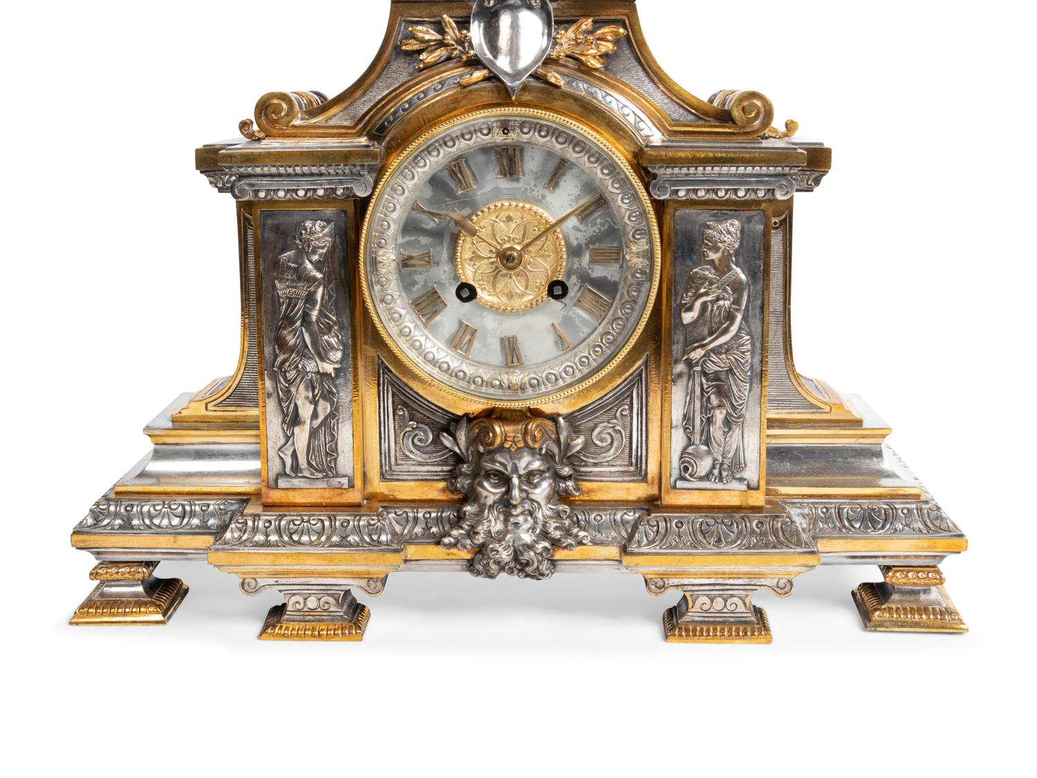A French Gilt and Silvered Bronze Figural Mantel Clock