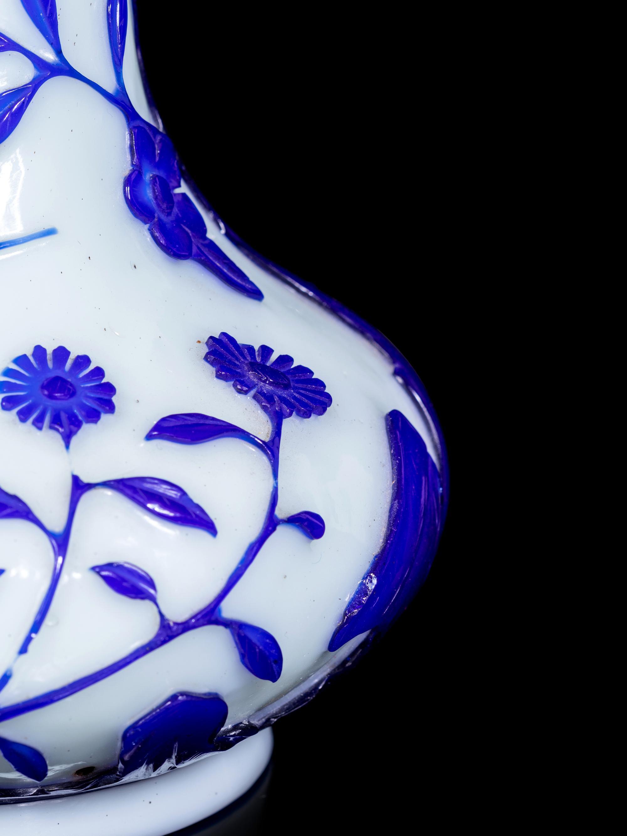 A Pair of Chinese Blue Overlay Opaque White Glass Bottle Vases
