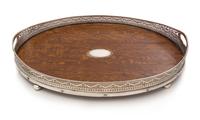 A Victorian Oak, Silver-Plate and Silver Serving Tray, Fenton Brothers, Sheffield, 1883, of handled oval form, together with four glass
