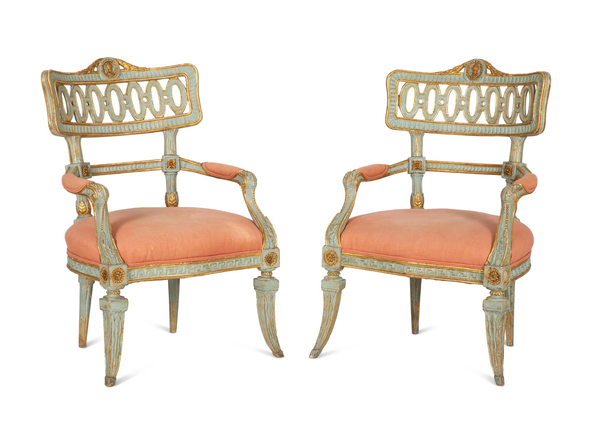 A Pair of Venetian Painted and Parcel Gilt Armchairs